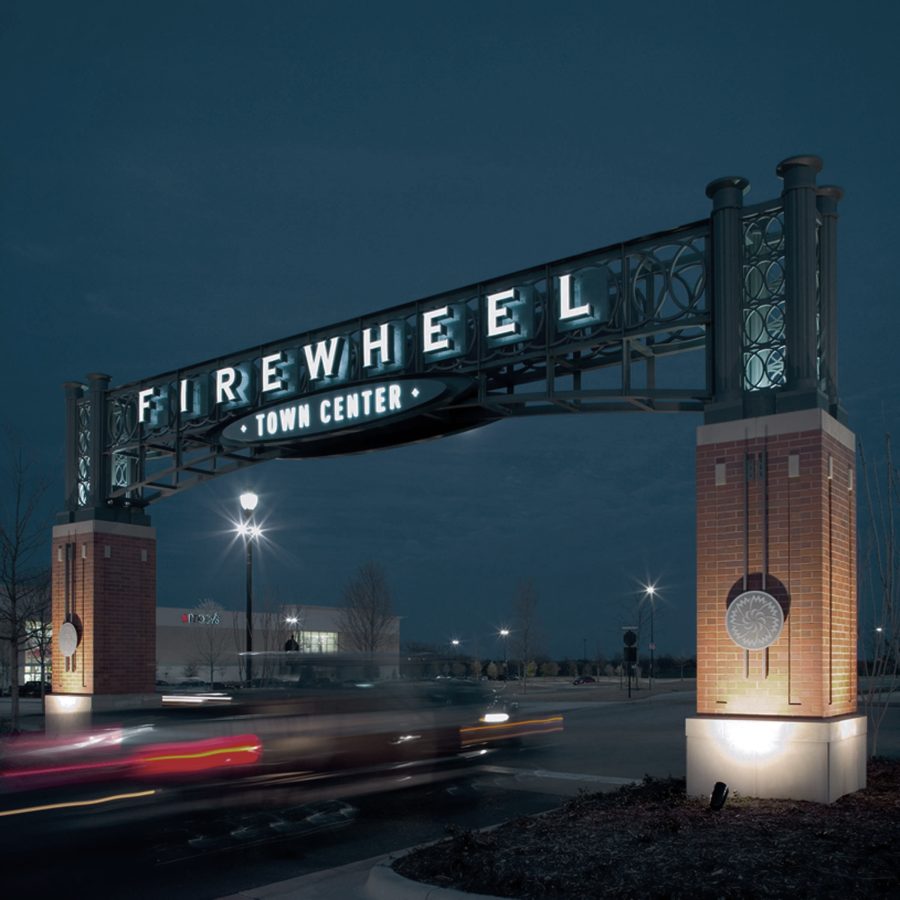 a sign that says firewheel wheel at night at The parcHAUS at Firewheel Parkway